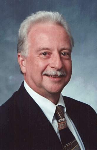 Founder; Carl V. Towe